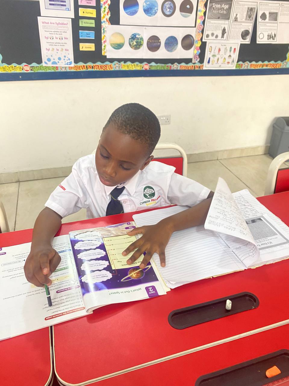 Primary student in classroom activities