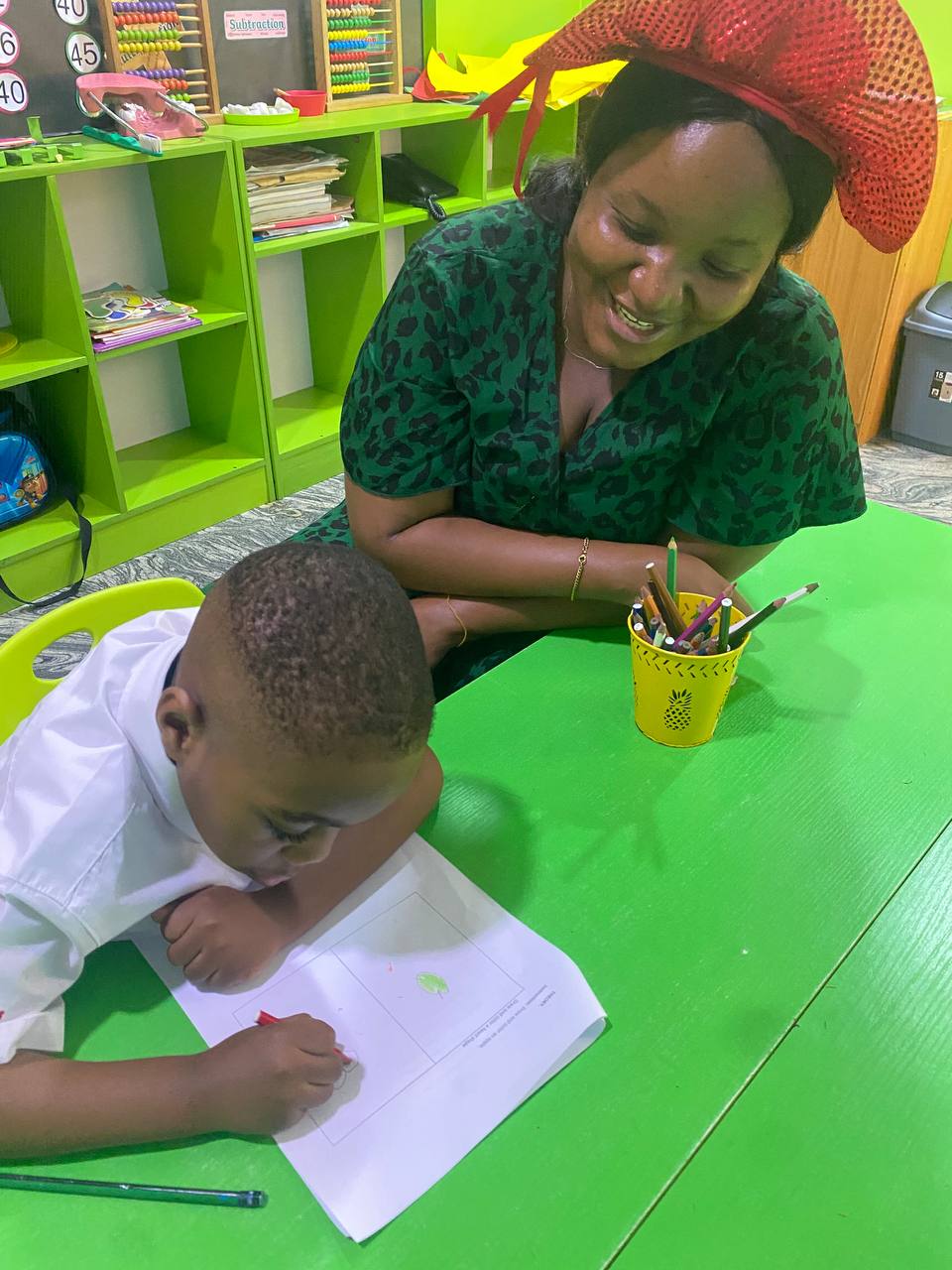 Preschool child engaged in classroom learning